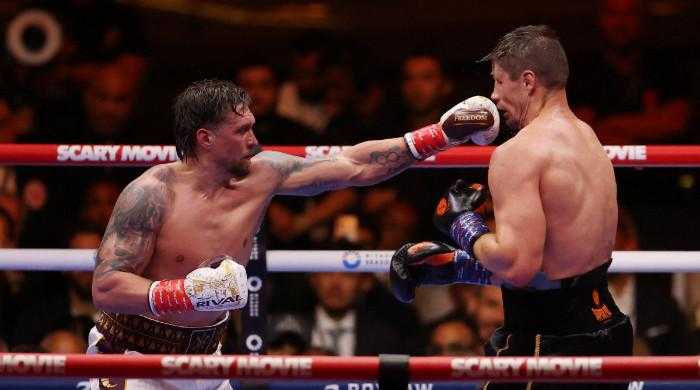 Oleksandr Usyk retains world titles after controversial win over Rico Verhoeven