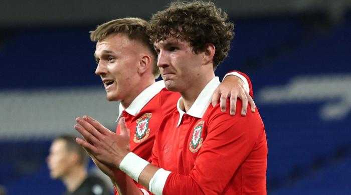 Lewis Koumas’ late header earns Wales draw against Ghana