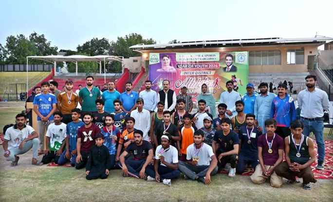Divisional Sports Officer and District Sports Officer Saima Manzoor Pose with Winners at Inter-District Athletics Championship